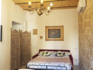 Letto o letti in una camera di Testaccio Charme Apt