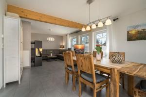Posezení v ubytování Ferienhaus-Seele-an-der-Mueritz