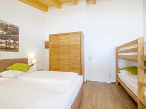 Postel nebo postele na pokoji v ubytování Hochkönigblick I
