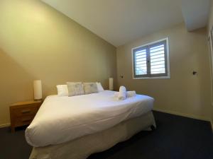 Ένα ή περισσότερα κρεβάτια σε δωμάτιο στο Oberdere 3 - Thredbo