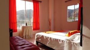 Postel nebo postele na pokoji v ubytování Hotel Taganga Dive Santa Marta