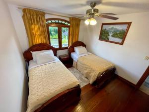 Posada Real客房内的一张或多张床位