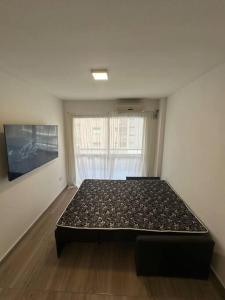 Una cama o camas en una habitación de Rondeau Suite