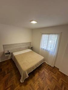 Una cama o camas en una habitación de Rondeau Suite