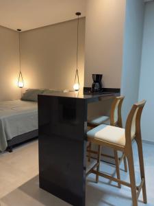 Ένα ή περισσότερα κρεβάτια σε δωμάτιο στο Flat em Alter do Chão