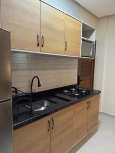 Η κουζίνα ή μικρή κουζίνα στο Flat em Alter do Chão