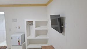 TV a/nebo společenská místnost v ubytování Pousada gransouza + 4 fotografie