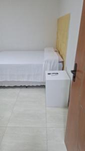 Postel nebo postele na pokoji v ubytování Pousada gransouza