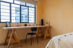 Ein Bett oder Betten in einem Zimmer der Unterkunft Gran casa para amigos a 4 cuadras del Zocalo