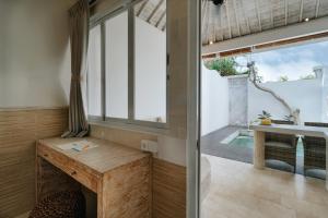 Kuchyň nebo kuchyňský kout v ubytování Villa Nakula Suites