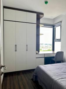 Postel nebo postele na pokoji v ubytování Aa Home - HH Commerce, Le Chan, Hai Phong