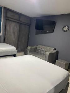 Postel nebo postele na pokoji v ubytování Hermosa vista mar y ciudad