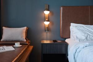 Postel nebo postele na pokoji v ubytování Rydges Ringwood