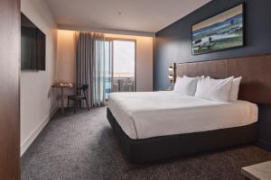 Postel nebo postele na pokoji v ubytování Rydges Ringwood + 37 fotografií