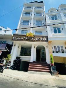 a white building with a sign for a hotel at Queen Villa 3 Hotel DL - by BAY LUXURY in Da Lat
