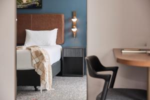 Postel nebo postele na pokoji v ubytování Rydges Ringwood