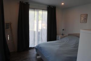 Una cama o camas en una habitación de Tinyhouse