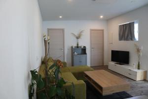 TV a/nebo společenská místnost v ubytování Tinyhouse