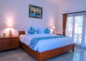 Ένα ή περισσότερα κρεβάτια σε δωμάτιο στο Semana Cliff Villa Ubud +48 φωτογραφίες