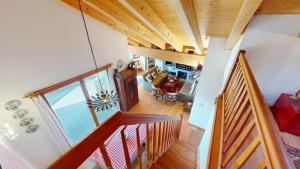 an overhead view of a staircase in a house at Piz Chalchagn in Pontresina