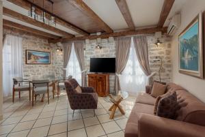 Μια τηλεόραση ή/και κέντρο ψυχαγωγίας στο Conte Hotel & Restaurant