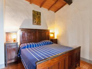 A bed or beds in a room at Farmhouse in Castelfranco Piandiscò with Garden