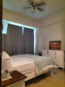 En eller flere senge i et værelse på One Madison Place + 13 billeder