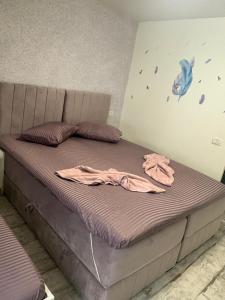 Postel nebo postele na pokoji v ubytování AmA