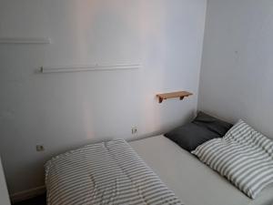 En eller flere senge i et værelse på Wohnung in Hahnenklee Goslar