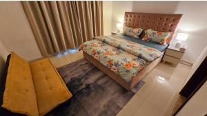 Postel nebo postele na pokoji v ubytování Deluxe Villa Rooms near Dubai Airport