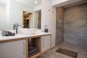 a bathroom with a sink and a shower at Eagles Nest in Knysna +33 photos