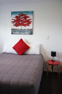 Postel nebo postele na pokoji v ubytování Gateway Motor Lodge - Wanganui