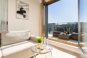 Posedenie v ubytovaní GA Luxury Apartments M45