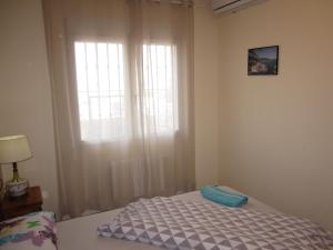 Postel nebo postele na pokoji v ubytování Apartemento Monika Monte Pedrera C 4 TOP Aussicht