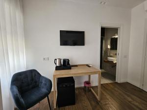 TV a/nebo společenská místnost v ubytování Be Your Home - Riviera Suites