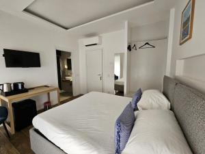 Postel nebo postele na pokoji v ubytování Be Your Home - Riviera Suites