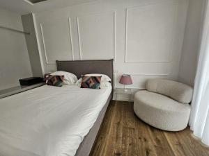 Postel nebo postele na pokoji v ubytování Be Your Home - Riviera Suites