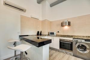 Kuchnia lub aneks kuchenny w obiekcie Sea view with shared terrace