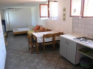 Kuchyň nebo kuchyňský kout v ubytování Apartments Vala