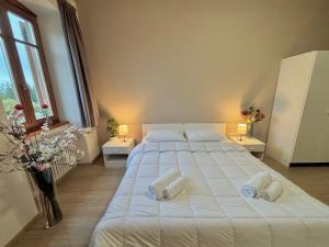 Ένα ή περισσότερα κρεβάτια σε δωμάτιο στο Hotel Corno Bianco