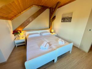 Ένα ή περισσότερα κρεβάτια σε δωμάτιο στο Hotel Corno Bianco