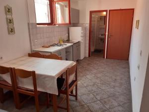 Kuchyň nebo kuchyňský kout v ubytování Apartments Vala