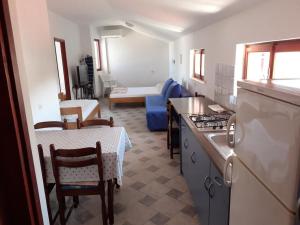 Kuchyň nebo kuchyňský kout v ubytování Apartments Vala