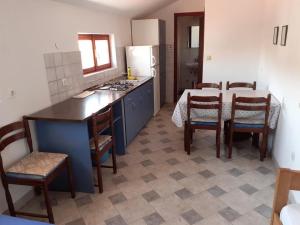 Kuchyň nebo kuchyňský kout v ubytování Apartments Vala