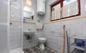 Koupelna v ubytování Apartments Vala