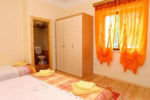 Posteľ alebo postele v izbe v ubytovaní Apartments Stuk