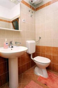 Kúpeľňa v ubytovaní Apartments Stuk