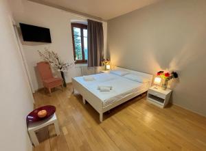 Ένα ή περισσότερα κρεβάτια σε δωμάτιο στο Hotel Corno Bianco