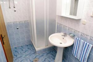 Kúpeľňa v ubytovaní Apartments Stuk + 27 fotografií