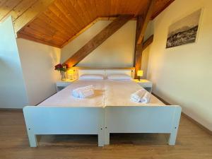 Ένα ή περισσότερα κρεβάτια σε δωμάτιο στο Hotel Corno Bianco